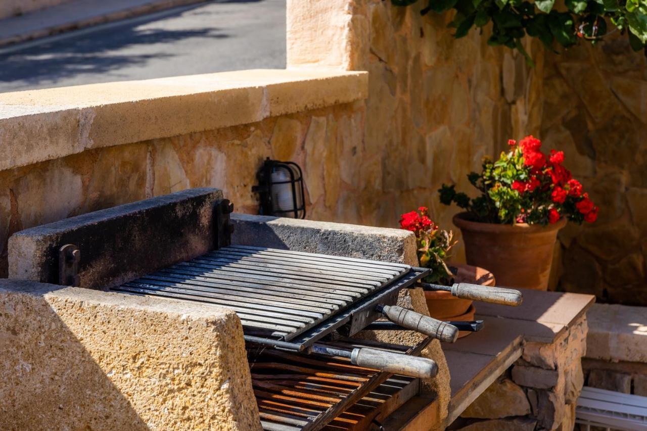 Apartamento La Pergola Font de sa Cala Esterno foto